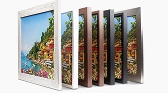 Multi-panel canvas wall art with customizable frame styles in a modern interior